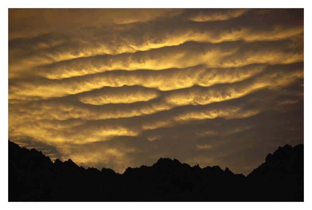 Cumulonimbus clouds at dawn above Norwest Arch, Ben Ohau Range, Southern Alps, New Zealand-Paper Art-20"x14"