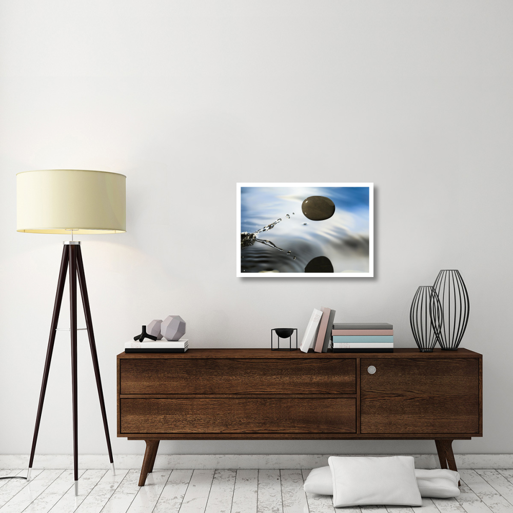 A rock skipping across the water's surface-Paper Art-32&quotx22"