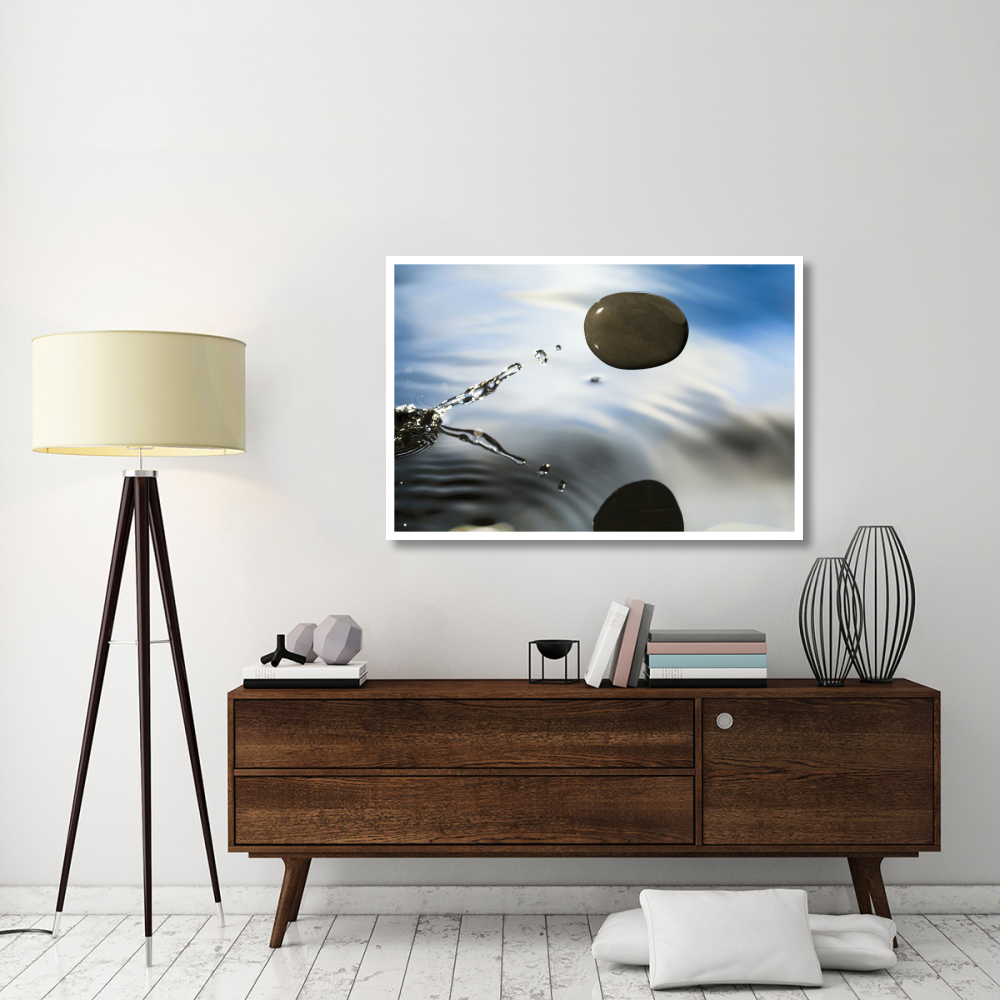 A rock skipping across the water's surface-Paper Art-50&quotx34"