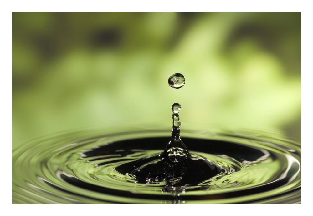 Ripples radiating out from drop of water splashing into calm pool-Paper Art-26"x18"