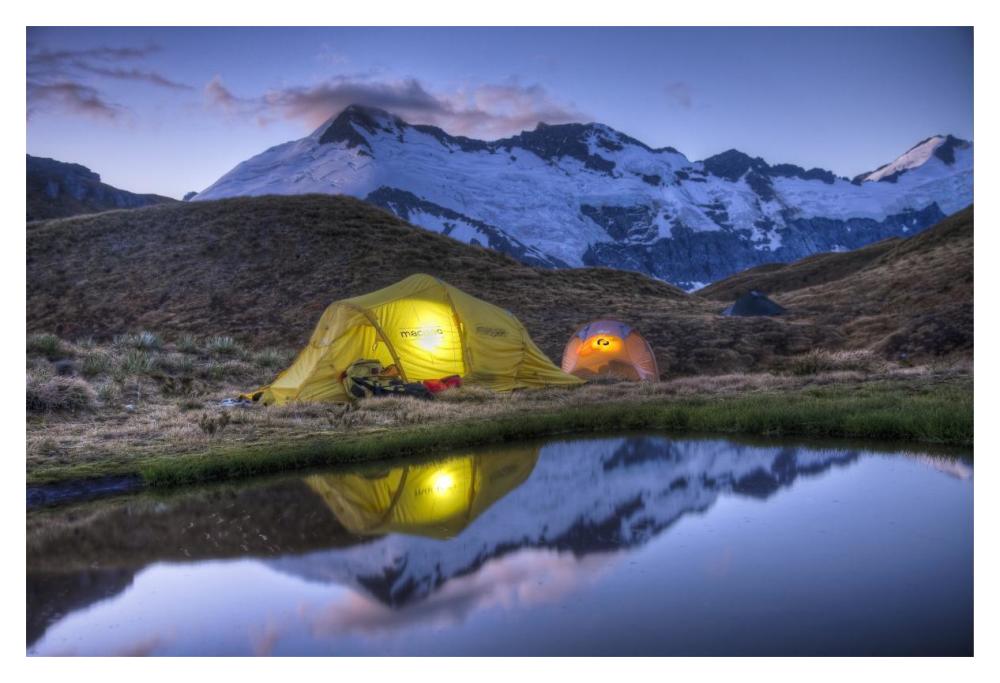 Campers read in tents lit by flashlight, Cascade Saddle, Mount Aspiring National Park, New Zealand-Paper Art-20"x14"