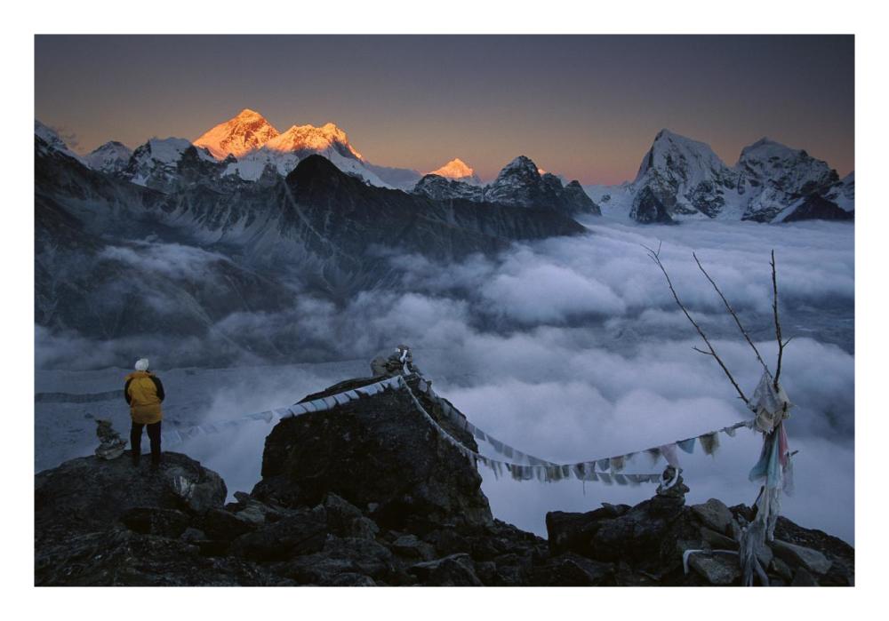Mountaineer enjoying the view of Mt Everest and the Himalayan Mountains at sunset from Gokyo Ri, Khumbu, Nepal-Paper Art-26"x18"