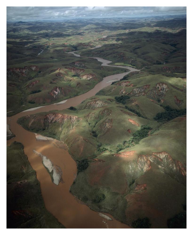 Deforested and deeply eroded hills alongside silted river, Betsiboka River, Madagascar-Paper Art-30"x37"